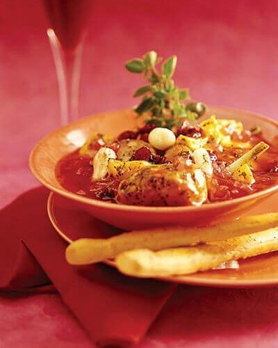 Cerdo con vino blanco y arándanos