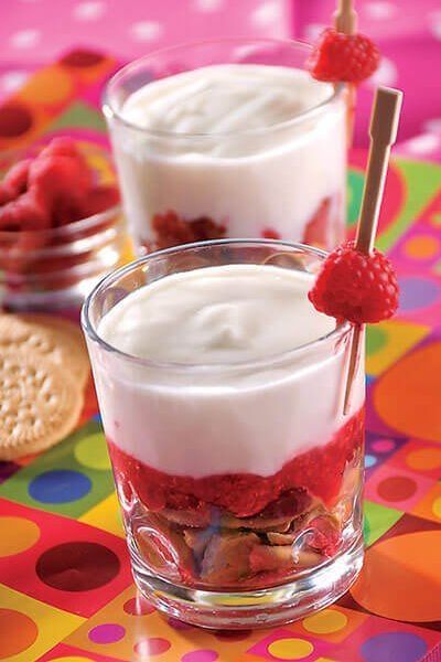 Cheesecake líquido con coulis de frambuesas