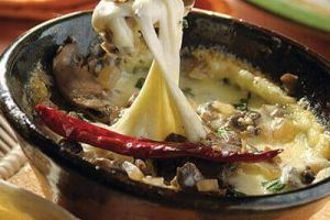 Cazuelita de queso con champiñones al ajillo