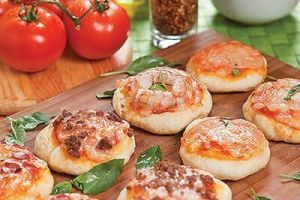 Mini pizzas de carne y camarón