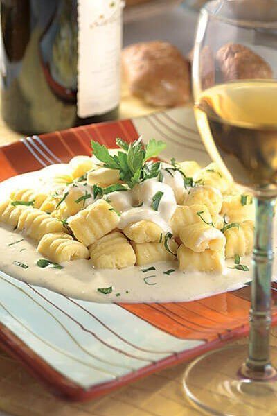 Ñoquis de papa con salsa de queso