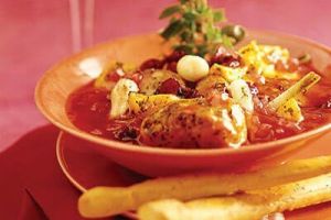 Cerdo con vino blanco y arándanos