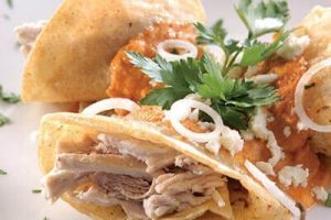 Dobladitas de cerdo con molito de cacahuate